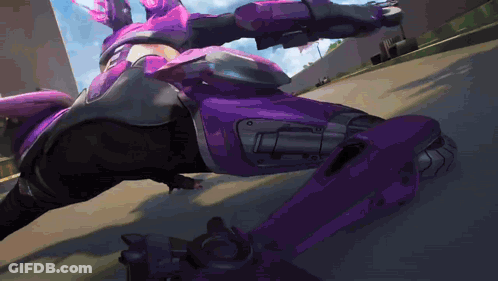 A Person In A Purple Costume Is Riding A Bike GIF