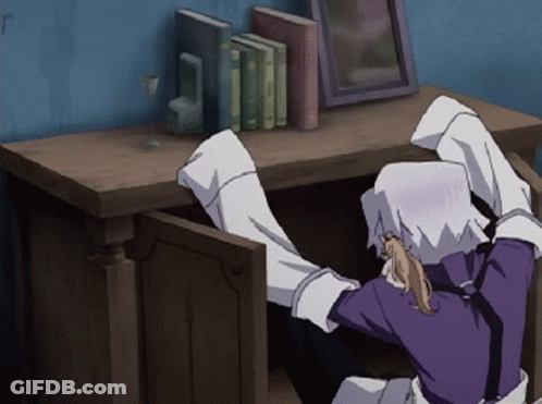 A Person In A Purple Shirt Is Crawling Out Of A Drawer GIF
