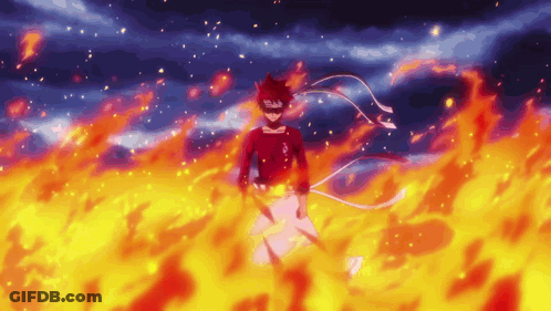 A Person In A Red Shirt Is Standing In A Field Of Fire GIF