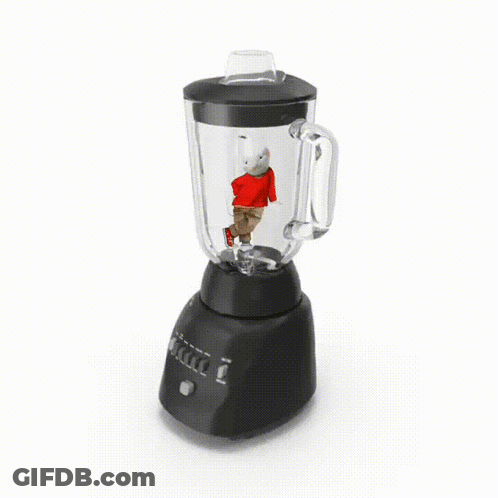 A Person In A Red Shirt Is Standing Inside Of A Blender GIF