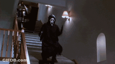 A Person In A Scream Mask Is Walking Down Stairs . GIF