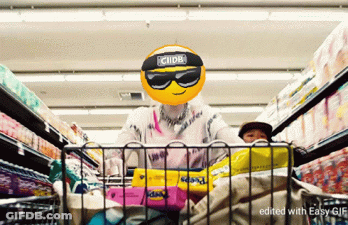 A Person In A Shopping Cart With A Smiley Face On Their Head That Says ' Clipb ' On It GIF