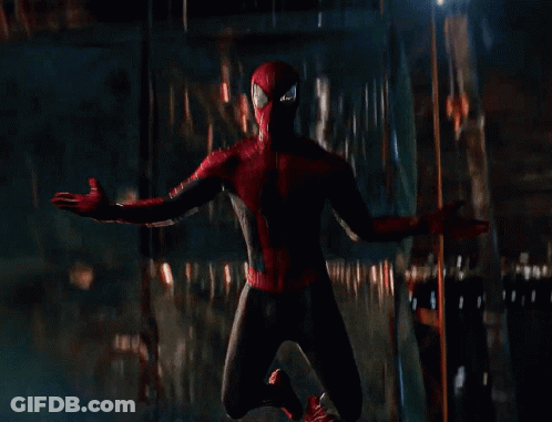 A Person In A Spiderman Costume Is Flying Through The Air GIF
