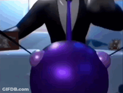 A Person In A Suit And Tie Is Holding A Purple Object GIF
