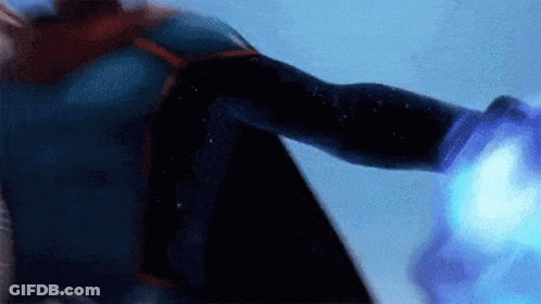 A Person In A Superhero Costume Is Holding A Blue Object GIF