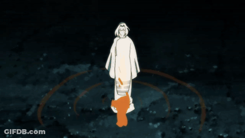 A Person In A White Robe Is Surrounded By A Circle Of Fire GIF