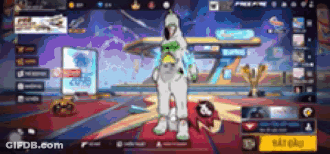 A Person In A White Suit Is Standing In A Room With A Blurred Background . GIF