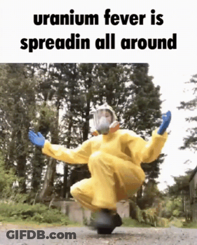 A Person In A Yellow Hazmat Suit Is Jumping In The Air With The Caption Uranium Fever Is Spreadin All Around . GIF