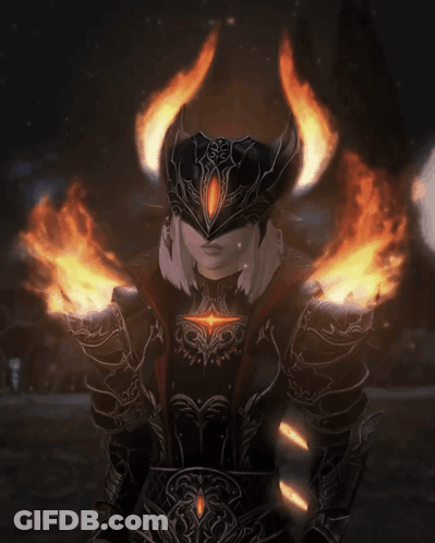 A Person In Armor With Flames Coming Out Of Them GIF
