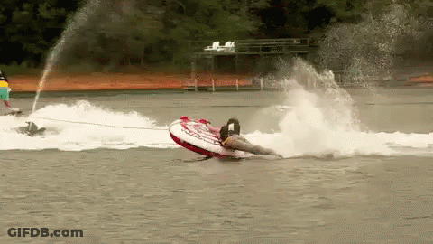 A Person Is Being Towed By A Jet Ski That Says ' Jet Ski ' On It GIF