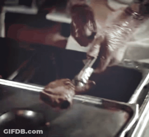 A Person Is Cooking A Piece Of Meat In A Frying Pan GIF