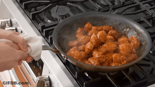 A Person Is Cooking Food In A Pan On A Stove That Has A Button That Says ' Off ' On It GIF