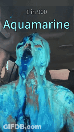 A Person Is Covered In Blue Paint And The Word Aquamarine Is Above Them GIF
