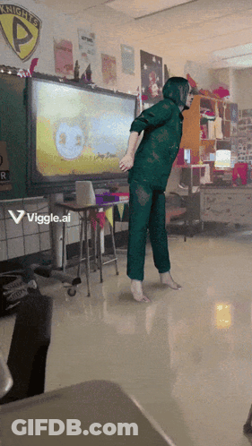 A Person Is Dancing In A Classroom With A Sign That Says Knights GIF