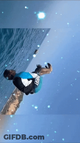A Person Is Doing A Trick In The Water And They Are Wearing A Shirt That Says " Target " GIF