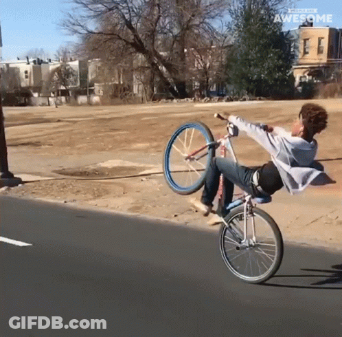 A Person Is Doing A Trick On A Bicycle With The Words Awesome Behind Them GIF