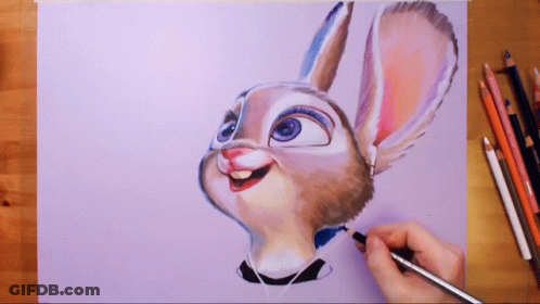 A Person Is Drawing A Bunny With A Pencil On A Piece Of Paper GIF