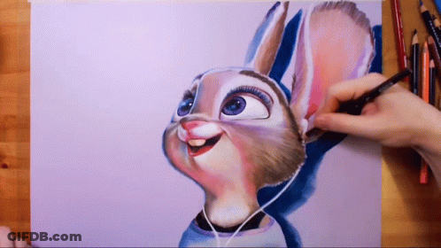 A Person Is Drawing A Cartoon Rabbit With Headphones GIF