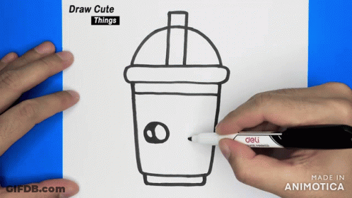A Person Is Drawing A Cup Of Coffee On A Piece Of Paper With A Deli Marker GIF