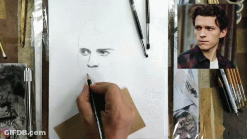A Person Is Drawing A Picture Of A Man 'S Face GIF