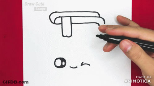 A Person Is Drawing A T On A Piece Of Paper With A Marker GIF