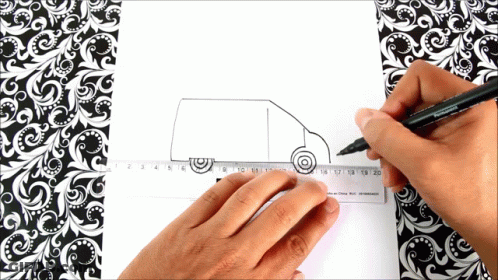 A Person Is Drawing A Van On A Ruler With A Pen GIF
