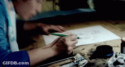 A Person Is Drawing With A Pencil On A Piece Of Paper . GIF