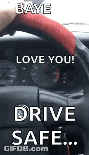 A Person Is Driving A Car With A Red Steering Wheel Cover And The Words `` Love You ! Drive Safe ! '' GIF