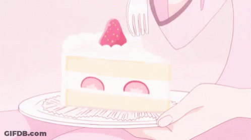 A Person Is Eating A Piece Of Cake With A Fork On A Plate . GIF