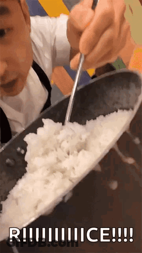 A Person Is Eating Rice With A Spoon In A Bowl With The Words Riiiiiiice !!! Below It GIF