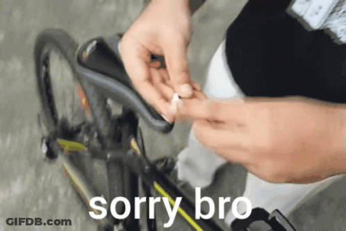 A Person Is Fixing A Bicycle With The Words Sorry Bro Below GIF