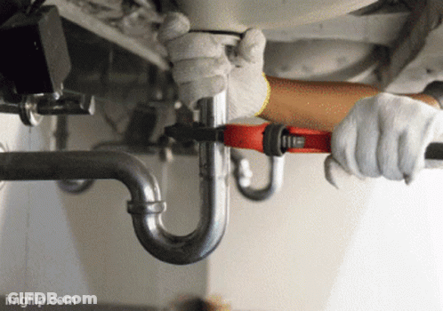 A Person Is Fixing A Pipe With A Wrench And The Website Imgflip.com Is Below GIF