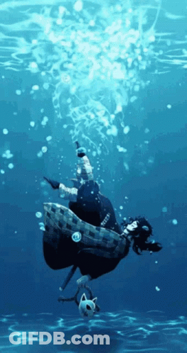 A Person Is Floating In The Water With Bubbles Coming Out Of It GIF