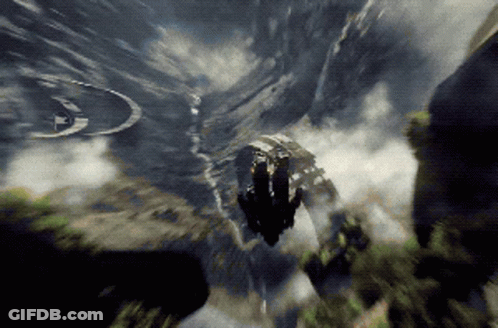 A Person Is Flying Through The Air With A Halo Emblem In The Background GIF