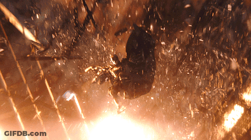 A Person Is Flying Through The Air With A Lot Of Sparks Coming Out Of It GIF