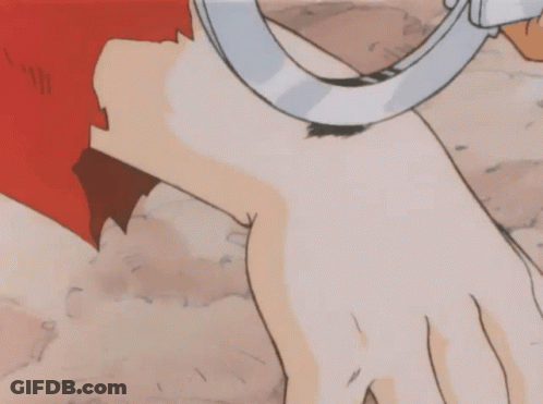 A Person Is Handcuffed To Another Person 'S Hand GIF