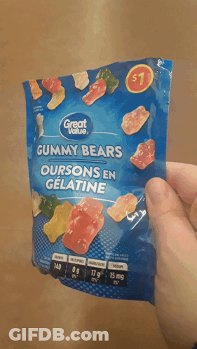 A Person Is Holding A Bag Of Gummy Bears That Cost $ 1 GIF