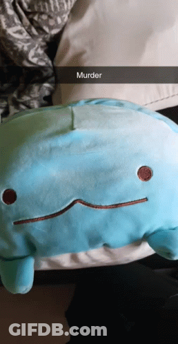 A Person Is Holding A Blue Stuffed Animal That Says Murder On It GIF