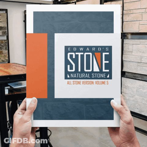 A Person Is Holding A Book Called Edward 'S Natural Stone GIF