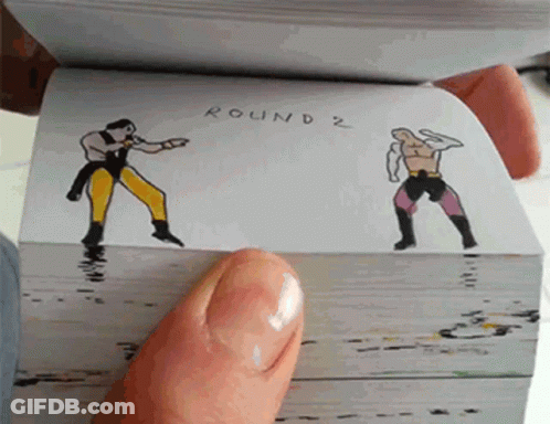 A Person Is Holding A Book Open To A Page That Says Round 2 On It GIF