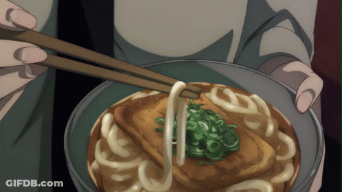A Person Is Holding A Bowl Of Food With Chopsticks GIF