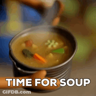 A Person Is Holding A Bowl Of Soup With The Words Time For Soup Above It . GIF