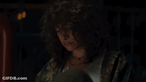 A Person Is Holding A Box That Has A Circle In The Middle GIF