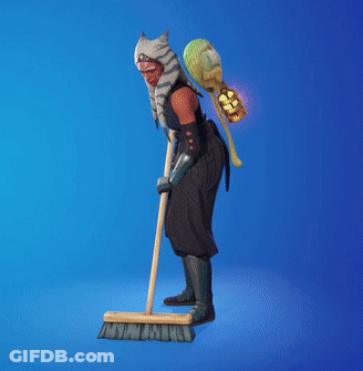 A Person Is Holding A Broom In Their Hand GIF