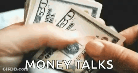 A Person Is Holding A Bunch Of Money In Their Hands And Says `` Money Talks '' . GIF
