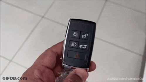 A Person Is Holding A Car Key In Their Hand With A Youtube.com Link Below It GIF