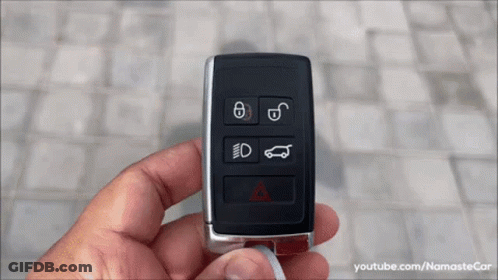 A Person Is Holding A Car Key With A Youtube Link At The Bottom Of The Screen GIF