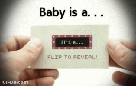 A Person Is Holding A Card That Says ' Baby Is A Flip To Reveal ' GIF