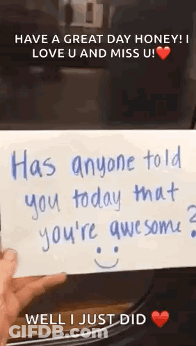 A Person Is Holding A Card That Says `` Has Anyone Told You Today That You 'Re Awesome ? `` GIF