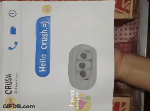 A Person Is Holding A Card That Says Hello Crush On It GIF